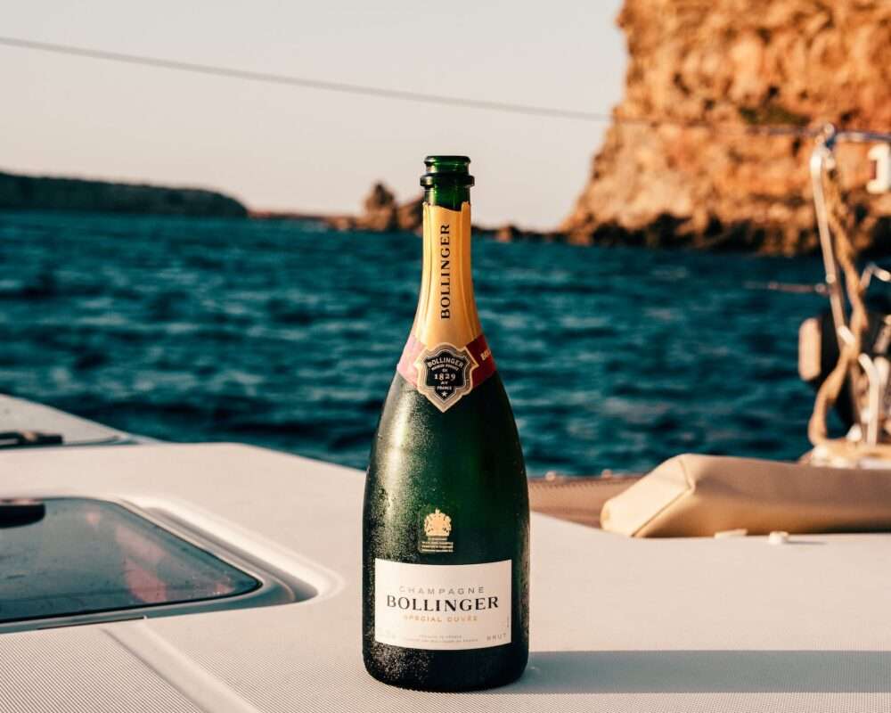 bollinger wine bottle on boat